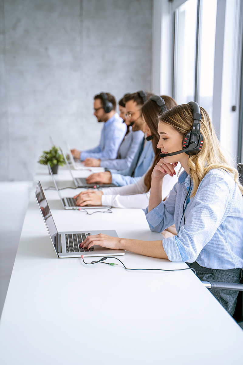 Customer support agent woman listening to client’s inquiries, demonstrating her dedication providing top-notch service